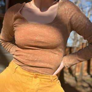 Burnt orange distressed ribbed long sleeve crop top